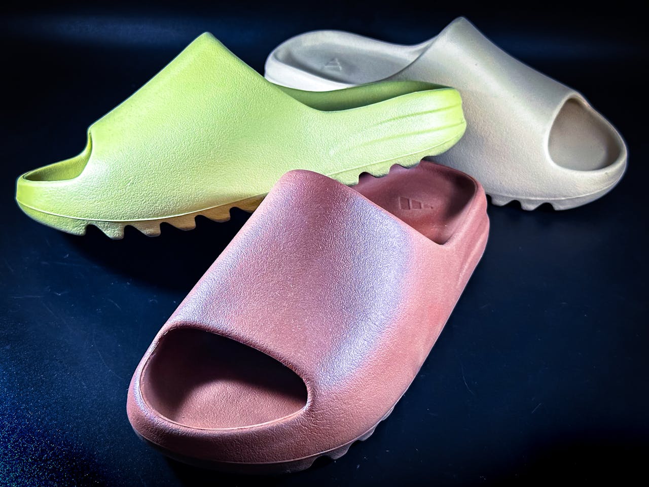 A vibrant collection of modern slides showcasing various colors on a textured surface.